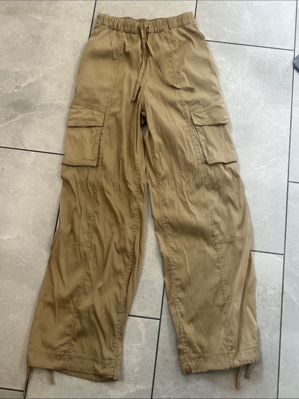 lululemon athletica Women's Cargo Joggers in Tan.